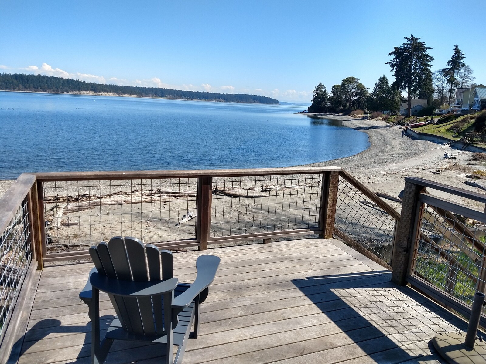 Deck view over Oak Bay with stairs to the beach